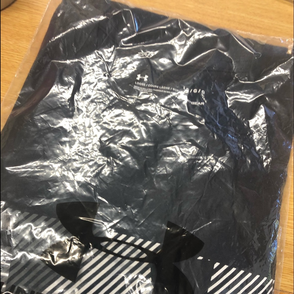 Brand new men’s Under Armour tee shirt.